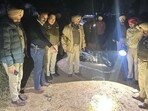The Punjab Police team at the encounter site in Ferozepur, where Gursimran Singh, the key conspirator of RSS activist Naveen Arora’s murder, was shot on Thursday. (HT Photo) The Punjab Police team at the encounter site in Ferozepur, where Gursimran Singh, the key conspirator of RSS activist Naveen Arora’s murder, was shot on Thursday. (HT Photo)