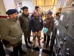 Security officials during an inspection drive of lockers of the doctors and medical staff at the Government Medical College (GMC) after an AK-47 rifle was recovered earlier this month.