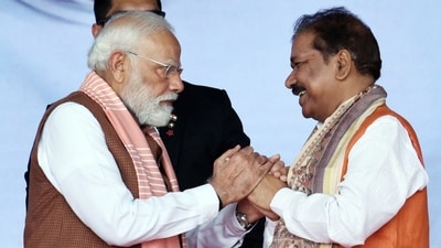 Newly sworn-in Bihar Minister Dilip Jaiswal greets Prime Minister Narendra Modi during the swearing-in ceremony, in Patna on Thursday. (ANI) Newly sworn-in Bihar Minister Dilip Jaiswal greets Prime Minister Narendra Modi during the swearing-in ceremony, in Patna on Thursday. (ANI)