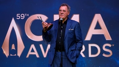 Vince Gill receives the Lifetime Achievement award at the 59th Annual Country Music Association Awards in Nashville. (REUTERS)