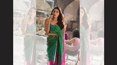 Alia Bhatt’s TV anchor character in Rocky Aur Rani Kii Prem Kahaani wore chiffon saris to the office. Alia Bhatt’s TV anchor character in Rocky Aur Rani Kii Prem Kahaani wore chiffon saris to the office.