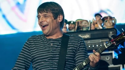 Bassist Gary "Mani" Mounfield of The Stone Roses performs on the main stage at the V Festival in Weston Park. (AP) Bassist Gary "Mani" Mounfield of The Stone Roses performs on the main stage at the V Festival in Weston Park. (AP)
