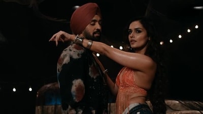 Manushi Chhillar featured alongside Diljit Dosanjh in the recently released song Kufar.