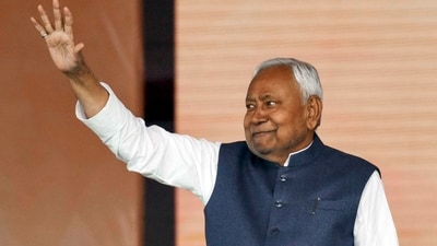 Patna: JD(U) supremo Nitish Kumar waves to the gathering during his swearing-in ceremony as the Chief Minister of Bihar. (PTI) Patna: JD(U) supremo Nitish Kumar waves to the gathering during his swearing-in ceremony as the Chief Minister of Bihar. (PTI)