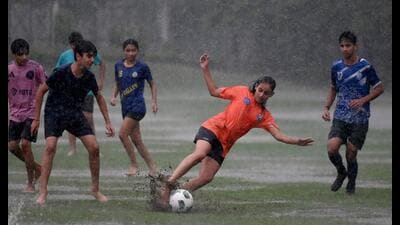 Noida, India-October 07, 2025:Football players enjoying football on a rainy day in Barua Football Training Centre at Noida Stadium sector 21A, in Noida, India, on Tuesday ,October 07, 2025. (Photo by Sunil Ghosh / Hindustan Times) (HT Photo) Noida, India-October 07, 2025:Football players enjoying football on a rainy day in Barua Football Training Centre at Noida Stadium sector 21A, in Noida, India, on Tuesday ,October 07, 2025. (Photo by Sunil Ghosh / Hindustan Times) (HT Photo)