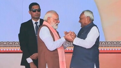 Screengrab showing Prime Minister Narendra Modi being greeted by Nitish Kumar after taking oath as the Chief Minister of Bihar. (PTI) Screengrab showing Prime Minister Narendra Modi being greeted by Nitish Kumar after taking oath as the Chief Minister of Bihar. (PTI)