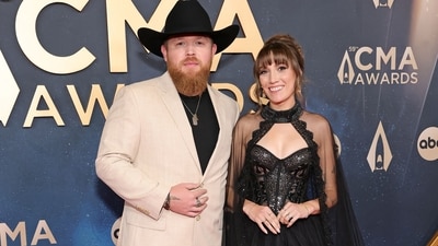 (L-R) Tyler Braden and guest attend the 59th Annual CMA Awards at Music City Center on November 19, 2025 in Nashville, Tennessee. (Getty Images via AFP) (L-R) Tyler Braden and guest attend the 59th Annual CMA Awards at Music City Center on November 19, 2025 in Nashville, Tennessee. (Getty Images via AFP)