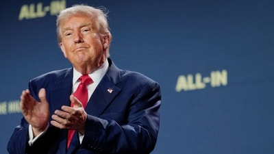 FILE PHOTO: U.S. President Donald Trump applauds at the "Winning the AI Race" Summit in Washington D.C., U.S., July 23, 2025. REUTERS/Kent Nishimura/File Photo (REUTERS)