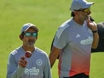 India's chief coach Gautam Gambhir, left, lofts a ball during a practice session