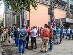 People evacuate buildings after tremors were felt due to an earthquake, in Kolkata on Friday morning. People evacuate buildings after tremors were felt due to an earthquake, in Kolkata on Friday morning.