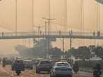 Smog engulfs the national highway near Burari early Friday. (Vipin Kumar/HT Photo) Smog engulfs the national highway near Burari early Friday. (Vipin Kumar/HT Photo)