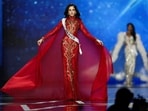Miss Mexico, Fátima Bosch, bagged the Miss Universe 2025 crown while dazzling in a sweeping, glittering red gown adorned with golden accents. A dramatic floor-length train cascaded from her shoulders, enhancing the regal silhouette, while her glowing, sultry makeup and rich black curls brought the entire look to a striking finish.(REUTERS)