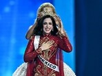 Miss Mexico Fatima Bosch (C) is crowned as she celebrates winning the 2025 Miss Universe pageant.