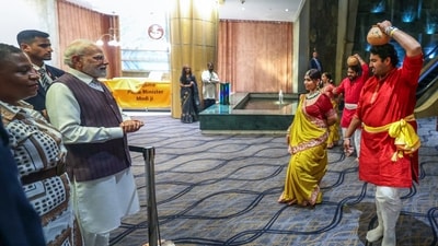Johannesburg [South Africa], Nov 21 (ANI): Prime Minister Narendra Modi being welcomed with cultural dances as he arrives in Johannesburg, for G20 Summit to be held from November 22- 23, in Johannesburg on Friday. Minister in the Presidency of South Africa, Khumbudzo Ntshavheni also present. (DPR PMO/ANI Photo) (DPR PMO)