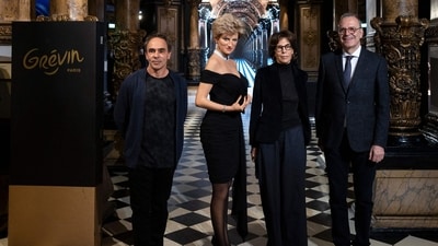 French sculptor Laurent Mallamaci (L), French author Christine Orban (2L) and Musee Grevin's French Director General Yves Delhommeau pose with the wax effigy of Britain's late Princess Diana "Lady Di", wearing the "revenge dress" during its unveiling at the Musee Grevin in Paris on November 20, 2025. The "revenge dress" is an evening gown worn by Diana, Princess of Wales, to a 1994 dinner at the Serpentine Gallery in Kensington Gardens. (AFP) French sculptor Laurent Mallamaci (L), French author Christine Orban (2L) and Musee Grevin's French Director General Yves Delhommeau pose with the wax effigy of Britain's late Princess Diana "Lady Di", wearing the "revenge dress" during its unveiling at the Musee Grevin in Paris on November 20, 2025. The "revenge dress" is an evening gown worn by Diana, Princess of Wales, to a 1994 dinner at the Serpentine Gallery in Kensington Gardens. (AFP)