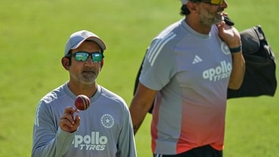 India's chief coach Gautam Gambhir, left, lofts a ball during a practice session (AP) India's chief coach Gautam Gambhir, left, lofts a ball during a practice session (AP)