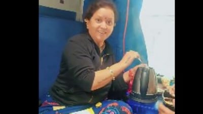 Railways issued a firm advisory after a video showed a traveller using an electric kettle to cook food onboard. (X/@WokePandemic) Railways issued a firm advisory after a video showed a traveller using an electric kettle to cook food onboard. (X/@WokePandemic)