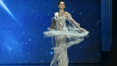 Miss Philippines Ahtisa Manalo, who finished as the third runner-up, appeared like a celestial nymph in an ethereal, sculpted ivory gown dusted with glitter, its wispy gossamer wings cascading around her arms and waist to create an airy, dreamlike silhouette that felt almost unreal. (AFP) Miss Philippines Ahtisa Manalo, who finished as the third runner-up, appeared like a celestial nymph in an ethereal, sculpted ivory gown dusted with glitter, its wispy gossamer wings cascading around her arms and waist to create an airy, dreamlike silhouette that felt almost unreal. (AFP)
