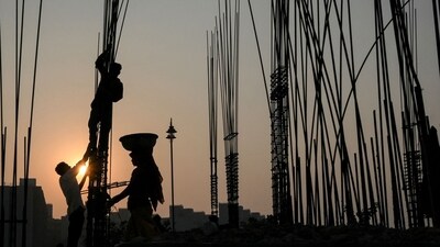 Labourers work at the Mahatma Gandhi Ashram redevelopment site in Ahmedabad on November 20, 2025. (Photo by Shammi MEHRA / AFP) (AFP)