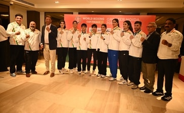 Boxing Federation of India, boxers posing with respective delegates. (BFI)