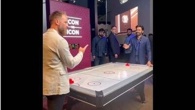 Dhanush and Kane Williamson play air hockey during the Dubai Watch Week. (X/@Chowdrey_Pro)