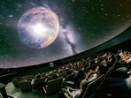 A show at the ESO Supernova Planetarium in Germany, built in 2018 with a 360-degree dome. Shows today invite visitors to zip through galaxies, tour clouds of asteroids, and observe meteors as they approach. (ESO / P Horálek) A show at the ESO Supernova Planetarium in Germany, built in 2018 with a 360-degree dome. Shows today invite visitors to zip through galaxies, tour clouds of asteroids, and observe meteors as they approach. (ESO / P Horálek)