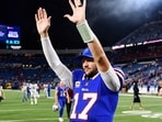 Buffalo Bills quarterback Josh Allen gestures to fans after the team's victory over the Miami Dolphins.