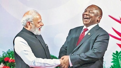 Prime Minister Narendra Modi being welcomed by South African President Cyril Ramaphosa upon his arrival to attend the G20 Leaders' Summit, in Johannesburg, South Africa. (PTI)