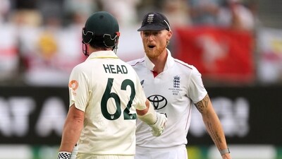England's Ben Stokes congratulates Australia's Travis Head as he walks after losing his wicket off the bowling of Brydon Carse (REUTERS)