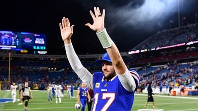 Buffalo Bills quarterback Josh Allen gestures to fans after the team's victory over the Miami Dolphins. (AP) Buffalo Bills quarterback Josh Allen gestures to fans after the team's victory over the Miami Dolphins. (AP)