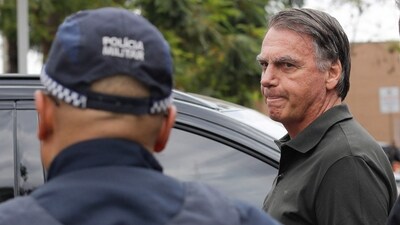 FILE: Former Brazilian President Jair Bolsonaro leaves the DF Star hospital in Brasilia on September 14, 2025, after undergoing a series of medical examinations, as he remains under house arrest. (Photo by Sergio Lima / AFP) (AFP) FILE: Former Brazilian President Jair Bolsonaro leaves the DF Star hospital in Brasilia on September 14, 2025, after undergoing a series of medical examinations, as he remains under house arrest. (Photo by Sergio Lima / AFP) (AFP)