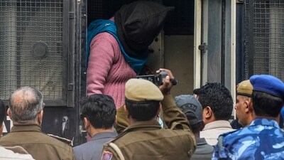 An accused in the car bomb blast near Red Fort, face covered, being brought to the Patiala House Court, in New Delhi, Thursday, Nov. 20, 2025. The four accused are Dr. Muzammil Shakeel Ganai of Pulwama, Dr. Adeel Ahmed Rather of Anantnag, Mufti Irfan Ahmad Wagay of Shopian in Jammu and Kashmir, and Dr. Shaheen Saeed of Lucknow. (PTI) An accused in the car bomb blast near Red Fort, face covered, being brought to the Patiala House Court, in New Delhi, Thursday, Nov. 20, 2025. The four accused are Dr. Muzammil Shakeel Ganai of Pulwama, Dr. Adeel Ahmed Rather of Anantnag, Mufti Irfan Ahmad Wagay of Shopian in Jammu and Kashmir, and Dr. Shaheen Saeed of Lucknow. (PTI)