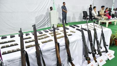 Weapons and ammunition deposited by 37 surrendered Maoists at an event at the DGP office in Hyderabad on Saturday. (ANI) Weapons and ammunition deposited by 37 surrendered Maoists at an event at the DGP office in Hyderabad on Saturday. (ANI)
