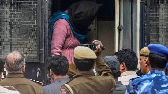 An accused in the car bomb blast near Red Fort, face covered, being brought to the Patiala House Court, in New Delhi, Thursday, Nov. 20, 2025. The four accused are Dr. Muzammil Shakeel Ganai of Pulwama, Dr. Adeel Ahmed Rather of Anantnag, Mufti Irfan Ahmad Wagay of Shopian in Jammu and Kashmir, and Dr. Shaheen Saeed of Lucknow. (PTI)