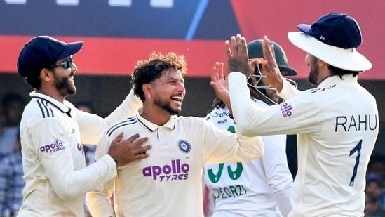India vs South Africa Highlights, 2nd Test Day 1: India's Kuldeep Yadav, front center, celebrates with Ravindra Jadeja, left, and KL Rahul after taking the wicket of South Africa's Wiaan Mulder. India vs South Africa Highlights, 2nd Test Day 1: India's Kuldeep Yadav, front center, celebrates with Ravindra Jadeja, left, and KL Rahul after taking the wicket of South Africa's Wiaan Mulder.