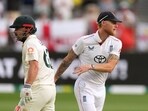 England's Ben Stokes congratulates Australia's Travis Head as he walks off. 