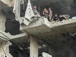 Rescuers search for survivors at the site of an Israeli air attack that targeted a residential building in Beirut's southern Haret Hreik neighbourhood on November 23, 2025. Rescuers search for survivors at the site of an Israeli air attack that targeted a residential building in Beirut's southern Haret Hreik neighbourhood on November 23, 2025.