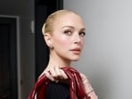 Lindsay Lohan shines in dark velvet gown at FTA Awards