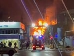 Video footage on Telegram showed balls of flames and black smoke rising into the night sky from the power station.