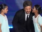 Shah Rukh Khan shares a sweet moment with kids on Global Peace Honours 2025 stage. Shah Rukh Khan shares a sweet moment with kids on Global Peace Honours 2025 stage.