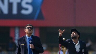 India's captain Rishabh Pant (R) tosses the coin as cricket commentator Ravi Shastri watches before the start of the second Test cricket match between India and South Africa (AFP) India's captain Rishabh Pant (R) tosses the coin as cricket commentator Ravi Shastri watches before the start of the second Test cricket match between India and South Africa (AFP)