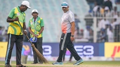 India's batting coach Sitanshu Kotak (R) inspects the pitch between India and South Africa Test match (AFP) India's batting coach Sitanshu Kotak (R) inspects the pitch between India and South Africa Test match (AFP)