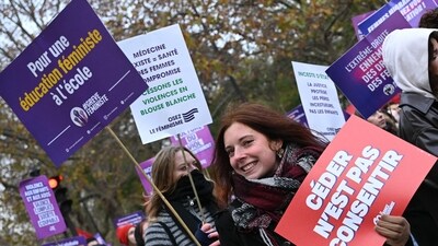 Hundreds of protesters also gathered in the cold in other cities, creating crowds awash in purple -- a colour linked to feminism. (AFP) Hundreds of protesters also gathered in the cold in other cities, creating crowds awash in purple -- a colour linked to feminism. (AFP)