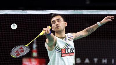 India’s Lakshya Sen hits a return to Japan’s Yushi Tanaka during the men's singles final at the Australian Open. (AFP)