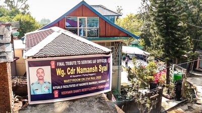 A banner pays tribute to late IAF wing commander Namansh Syal, in Kangra on Sunday. Syal was killed on Nov. 21 after the indigenous multi-role Light Combat Aircraft (LCA) Tejas crashed during an aerial display. (PTI) A banner pays tribute to late IAF wing commander Namansh Syal, in Kangra on Sunday. Syal was killed on Nov. 21 after the indigenous multi-role Light Combat Aircraft (LCA) Tejas crashed during an aerial display. (PTI)