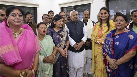 Bihar chief minister Nitish Kumar with newly sworn-in cabinet ministers in Patna. (PTI)