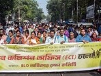 Booth Level Officers (BLO) stage a protest against Election Commission of India, in Kolkata on Monday. 
