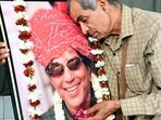 A fan mourns the loss of late veteran actor Dharmendra, who passed away at 89, in Bikaner on Monday. A fan mourns the loss of late veteran actor Dharmendra, who passed away at 89, in Bikaner on Monday.