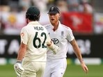 England's Ben Stokes congratulates Australia's Travis Head as he walks after losing his wicket. 