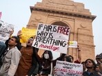 People raise slogans during a protest against worsening air quality in the national capital, at the India Gate, in New Delhi. People raise slogans during a protest against worsening air quality in the national capital, at the India Gate, in New Delhi.